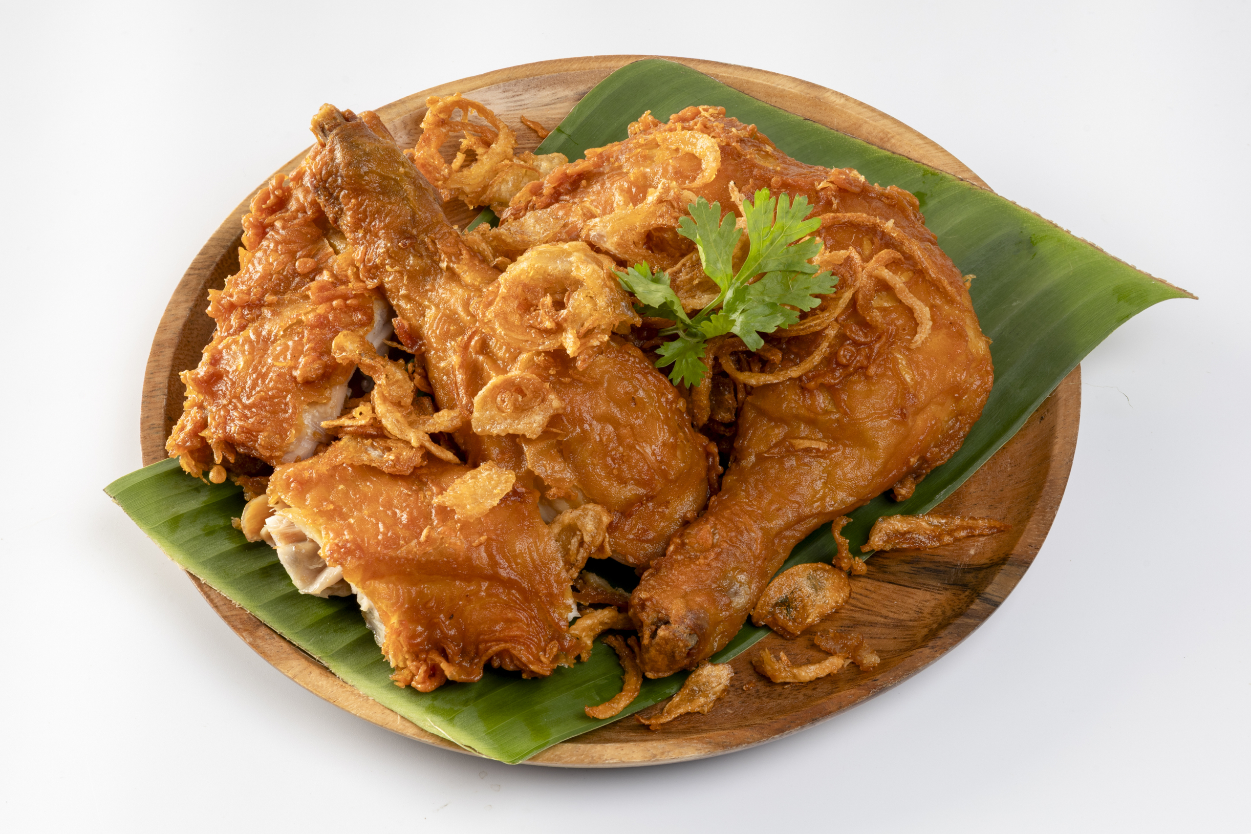 Hat Yai Fried Chicken, crispy fried chicken with fried on a white background.